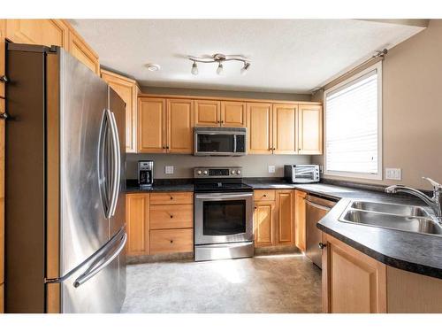 111 Northlands Way Ne, Medicine Hat, AB - Indoor Photo Showing Kitchen With Double Sink