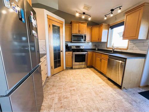 2317 11 Avenue Ne, Medicine Hat, AB - Indoor Photo Showing Kitchen With Stainless Steel Kitchen With Double Sink