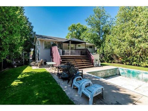 961 Bassett Crescent Nw, Medicine Hat, AB - Outdoor With In Ground Pool With Deck Patio Veranda