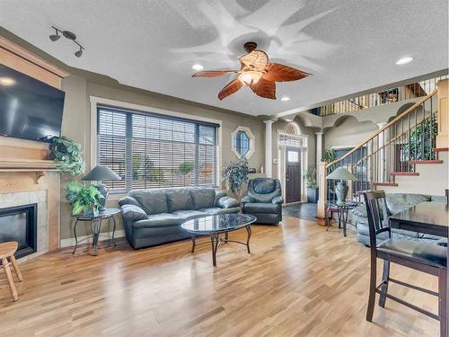 770 Eagle Ridge Drive, Dunmore, AB - Indoor Photo Showing Living Room With Fireplace