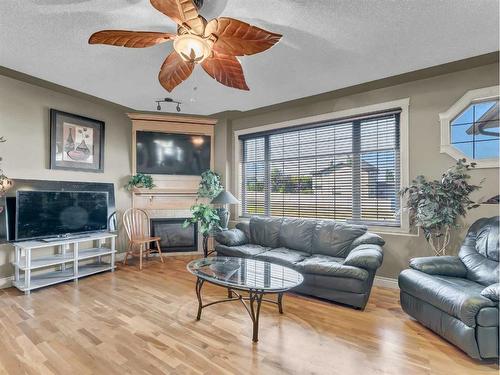 770 Eagle Ridge Drive, Dunmore, AB - Indoor Photo Showing Living Room With Fireplace