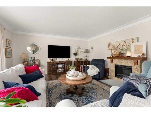 333 Prospect Drive Sw, Medicine Hat, AB - Indoor Photo Showing Living Room With Fireplace