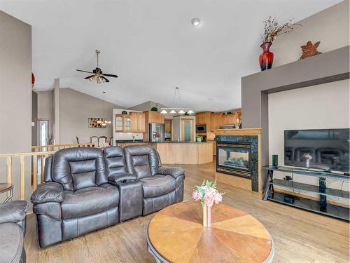 41 Stein Close Se, Medicine Hat, AB - Indoor Photo Showing Living Room With Fireplace