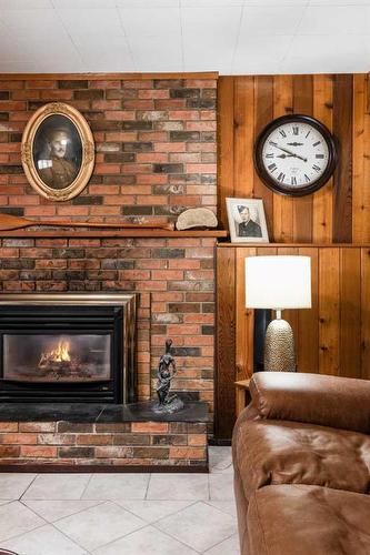 242 Carry Drive Se, Medicine Hat, AB - Indoor Photo Showing Living Room With Fireplace