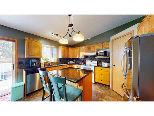 155 3 Street Ne, Medicine Hat, AB - Indoor Photo Showing Kitchen With Double Sink