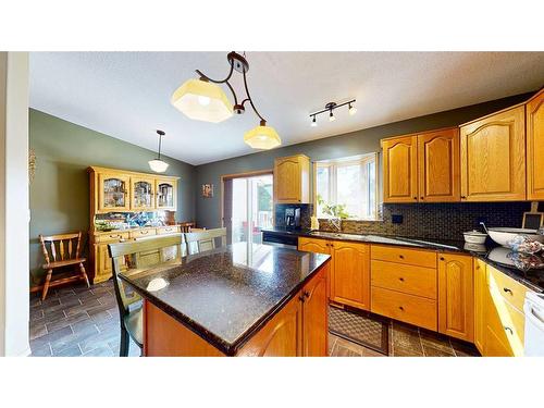 155 3 Street Ne, Medicine Hat, AB - Indoor Photo Showing Kitchen With Double Sink