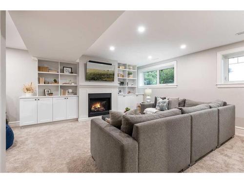 52 Cunliffe Crescent Se, Medicine Hat, AB - Indoor Photo Showing Living Room With Fireplace