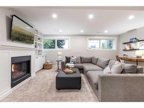 52 Cunliffe Crescent Se, Medicine Hat, AB - Indoor Photo Showing Living Room With Fireplace