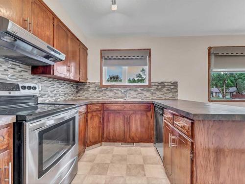 2569 24 Street Se, Medicine Hat, AB - Indoor Photo Showing Kitchen With Double Sink