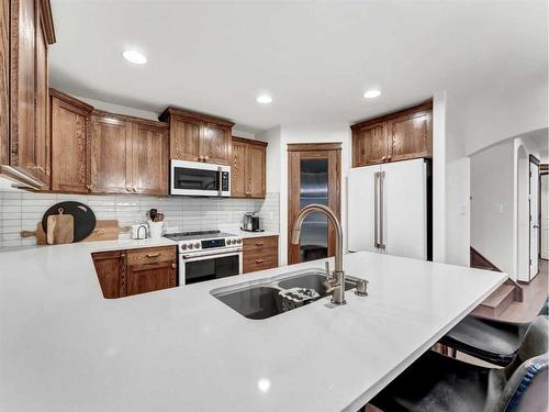 74 Terrace Court Ne, Medicine Hat, AB - Indoor Photo Showing Kitchen With Double Sink With Upgraded Kitchen