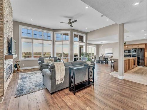 26 Palisades Lane Ne, Medicine Hat, AB - Indoor Photo Showing Living Room With Fireplace