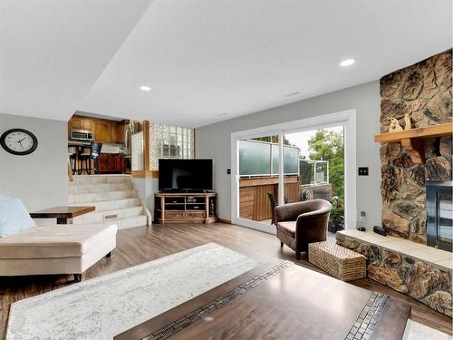 34 Cook Court Se, Medicine Hat, AB - Indoor Photo Showing Living Room With Fireplace