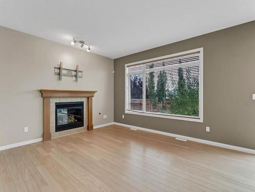 8 Terrace Avenue Ne, Medicine Hat, AB - Indoor Photo Showing Living Room With Fireplace