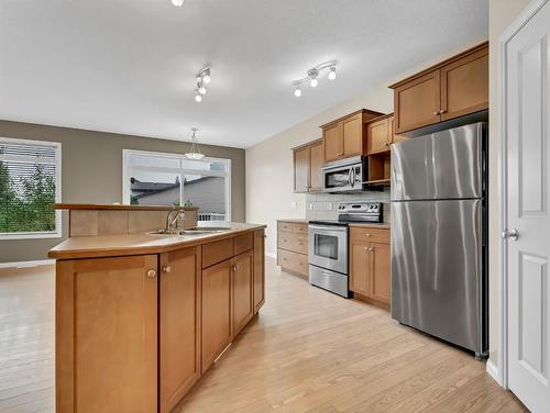 8 Terrace Avenue Ne, Medicine Hat, AB - Indoor Photo Showing Kitchen With Double Sink