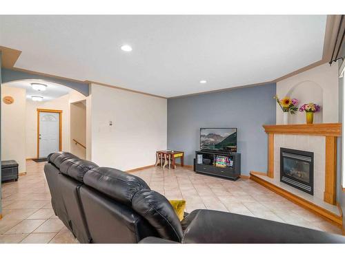 194 Ranchlands Boulevard Ne, Medicine Hat, AB - Indoor Photo Showing Living Room With Fireplace