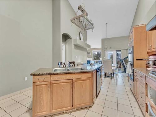 15 Taylor Mews Se, Medicine Hat, AB - Indoor Photo Showing Kitchen With Double Sink