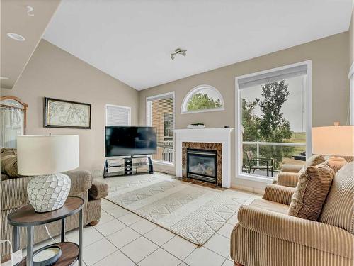 15 Taylor Mews Se, Medicine Hat, AB - Indoor Photo Showing Living Room With Fireplace