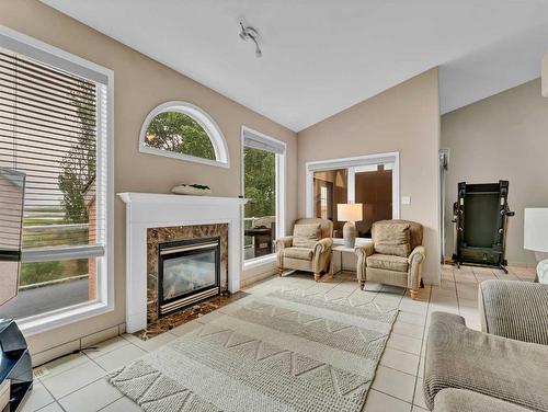 15 Taylor Mews Se, Medicine Hat, AB - Indoor Photo Showing Living Room With Fireplace