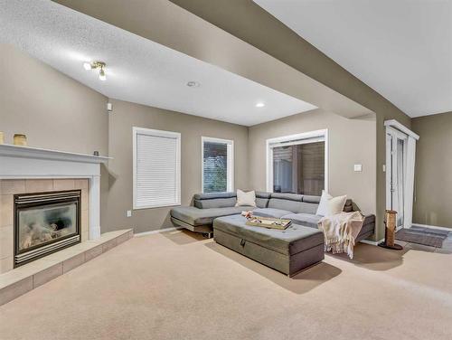 15 Taylor Mews Se, Medicine Hat, AB - Indoor Photo Showing Living Room With Fireplace