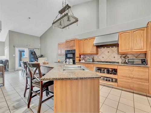 15 Taylor Mews Se, Medicine Hat, AB - Indoor Photo Showing Kitchen With Double Sink