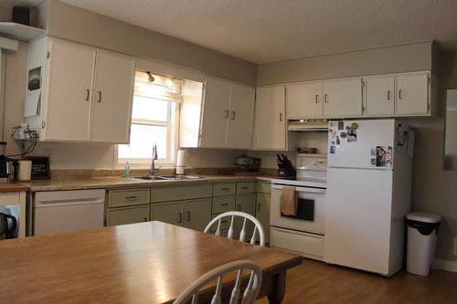 400 Centre Street East, Bow Island, AB - Indoor Photo Showing Kitchen With Double Sink