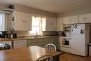 400 Centre Street East, Bow Island, AB  - Indoor Photo Showing Kitchen With Double Sink 