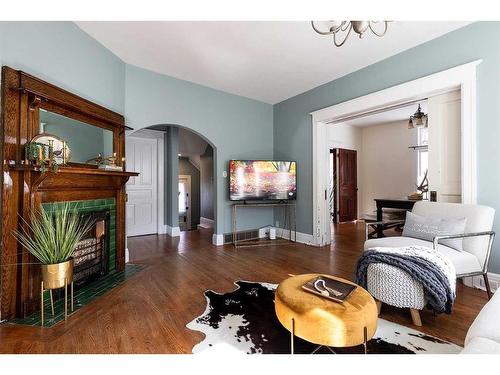 844A 4 Street Se, Medicine Hat, AB - Indoor Photo Showing Living Room With Fireplace