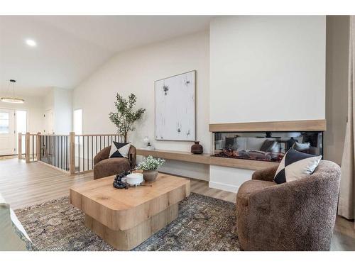 124 Hamptons Crescent Se, Medicine Hat, AB - Indoor Photo Showing Living Room With Fireplace