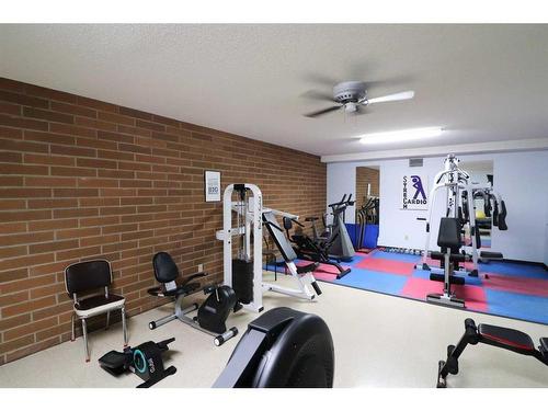 225-3090 15 Avenue Se, Medicine Hat, AB - Indoor Photo Showing Gym Room