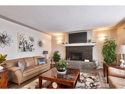 2298 Higdon Avenue Se, Medicine Hat, AB - Indoor Photo Showing Living Room With Fireplace