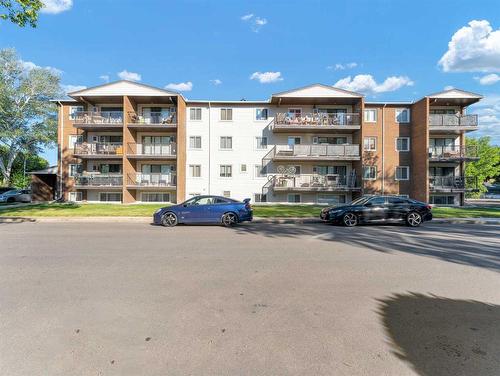 201-130A 2 Street Ne, Medicine Hat, AB - Outdoor With Balcony With Facade