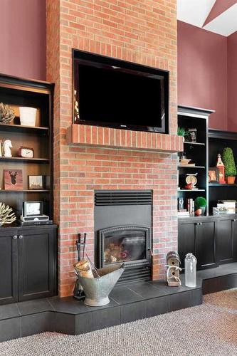 210 6 Avenue, Rural Cypress County, AB - Indoor Photo Showing Living Room With Fireplace