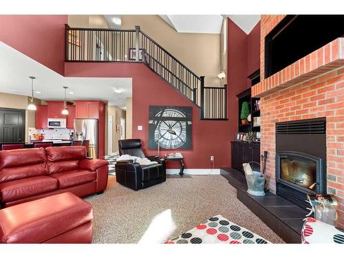 210 6 Avenue, Rural Cypress County, AB - Indoor Photo Showing Living Room With Fireplace