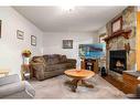 30 1St Street Nw, Medicine Hat, AB  - Indoor Photo Showing Living Room With Fireplace 