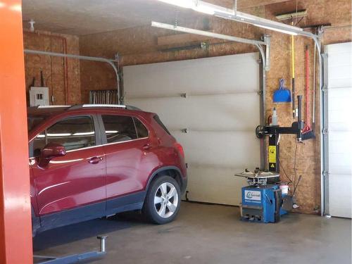 2 1 Street West, Schuler, AB - Indoor Photo Showing Garage