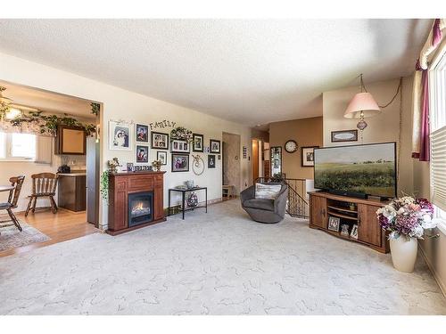 93 Clelland Crescent Se, Medicine Hat, AB - Indoor With Fireplace