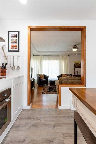 113 12 Street Se, Medicine Hat, AB - Indoor Photo Showing Other Room With Fireplace