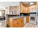 113-194 Sunrise Circle Sw, Medicine Hat, AB  - Indoor Photo Showing Kitchen With Double Sink 