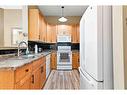 113-194 Sunrise Circle Sw, Medicine Hat, AB  - Indoor Photo Showing Kitchen With Double Sink 