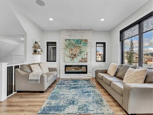 196 Hamptons Crescent Se, Medicine Hat, AB - Indoor Photo Showing Living Room With Fireplace