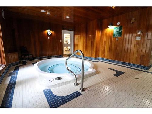 423-1535 Southview Drive Se, Medicine Hat, AB - Indoor Photo Showing Other Room With In Ground Pool