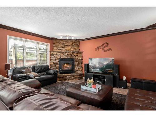 111 Sunrise Circle Sw, Medicine Hat, AB - Indoor Photo Showing Living Room With Fireplace