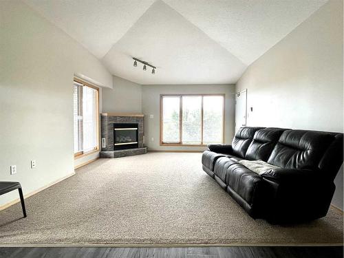 5-359 4 Street Se, Medicine Hat, AB - Indoor Photo Showing Living Room With Fireplace