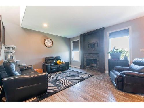 96 Somerside Way Se, Medicine Hat, AB - Indoor Photo Showing Living Room With Fireplace