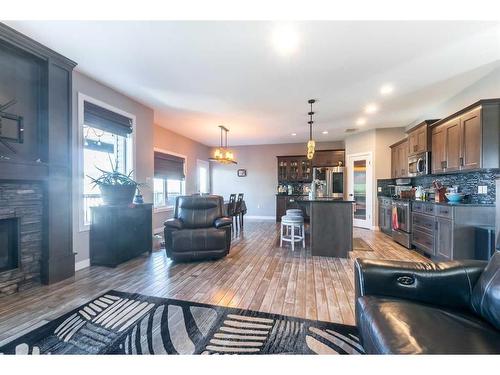 96 Somerside Way Se, Medicine Hat, AB - Indoor Photo Showing Living Room With Fireplace