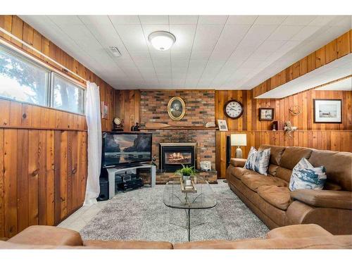 242 Carry Drive Se, Medicine Hat, AB - Indoor Photo Showing Living Room With Fireplace