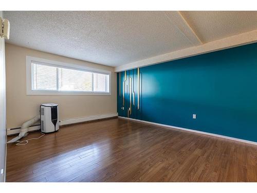 105-130A 2 Street Ne, Medicine Hat, AB - Indoor Photo Showing Other Room