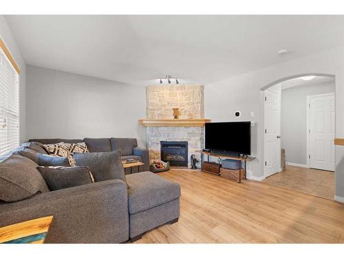 438 Vista Drive Se, Medicine Hat, AB - Indoor Photo Showing Living Room With Fireplace