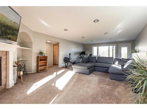 20 Cottonwood Close Sw, Medicine Hat, AB - Indoor Photo Showing Living Room With Fireplace