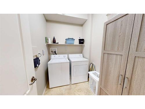 207-2800 13 Avenue Se, Medicine Hat, AB - Indoor Photo Showing Laundry Room